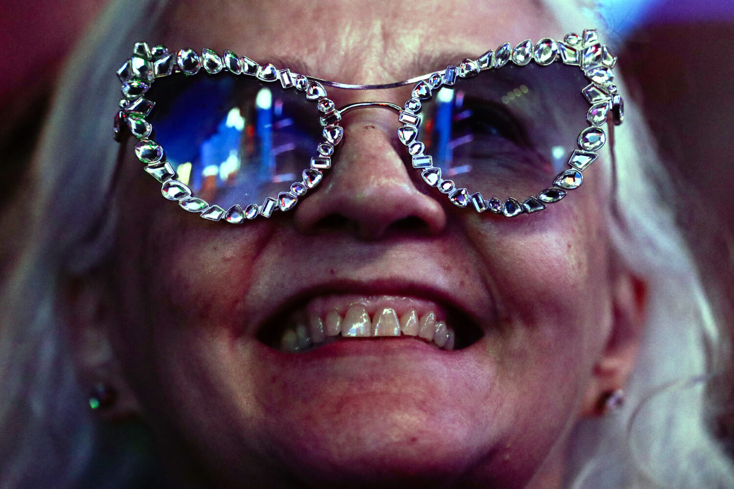 FILE - A fan attends the performance by American singer Jon Batiste at the Rock in Rio music festiv...