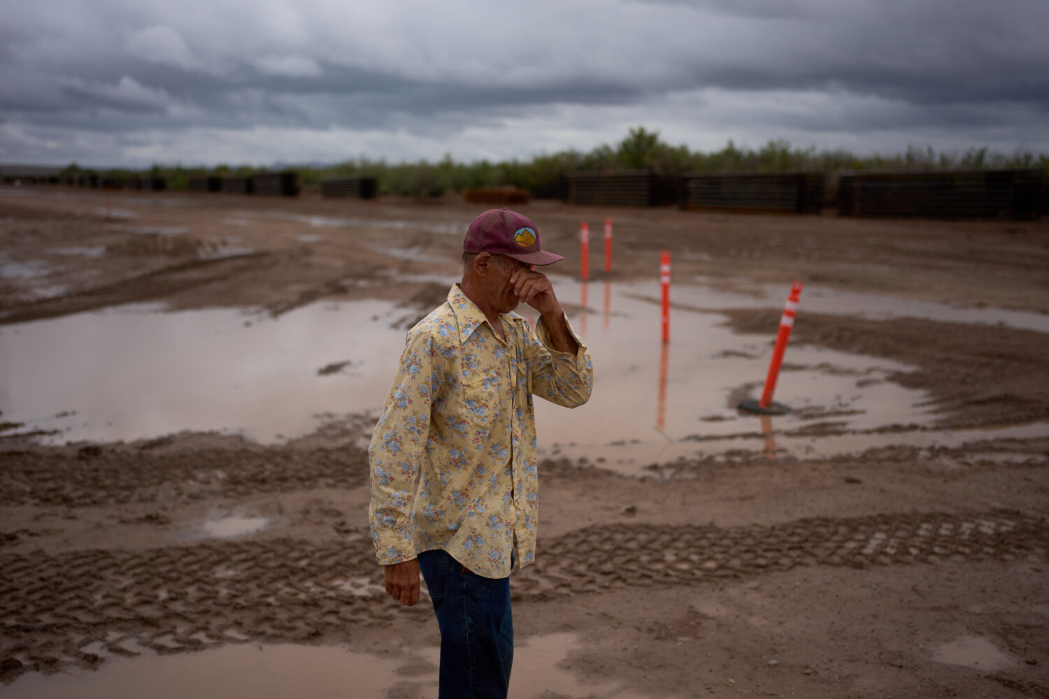 Bill Addington reacts as he visits a border wall construction area near his property, Wednesday, Se...