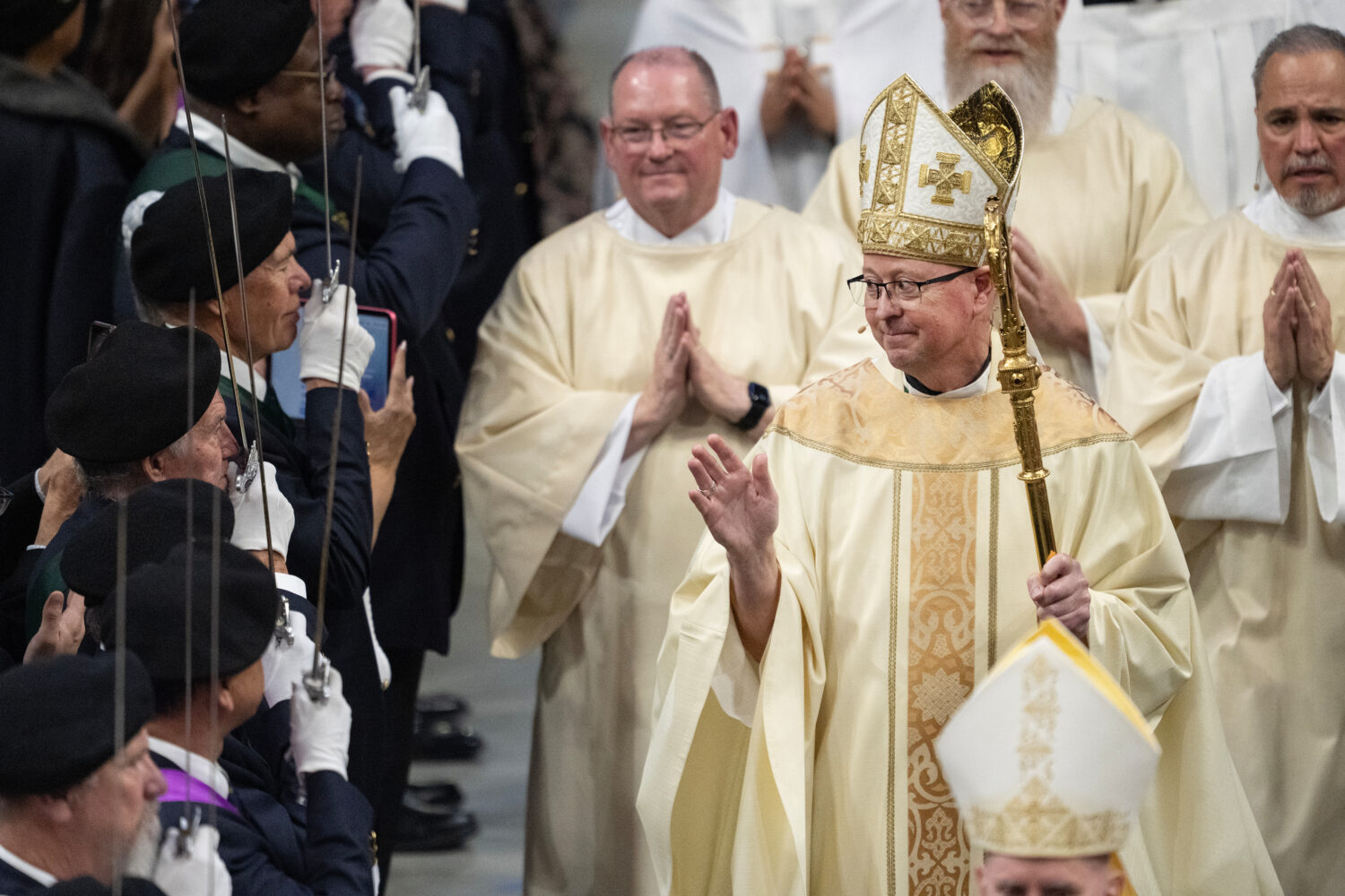 FILE - Archbishop James R. Golka blesses members of the congregations during the recessional proces...