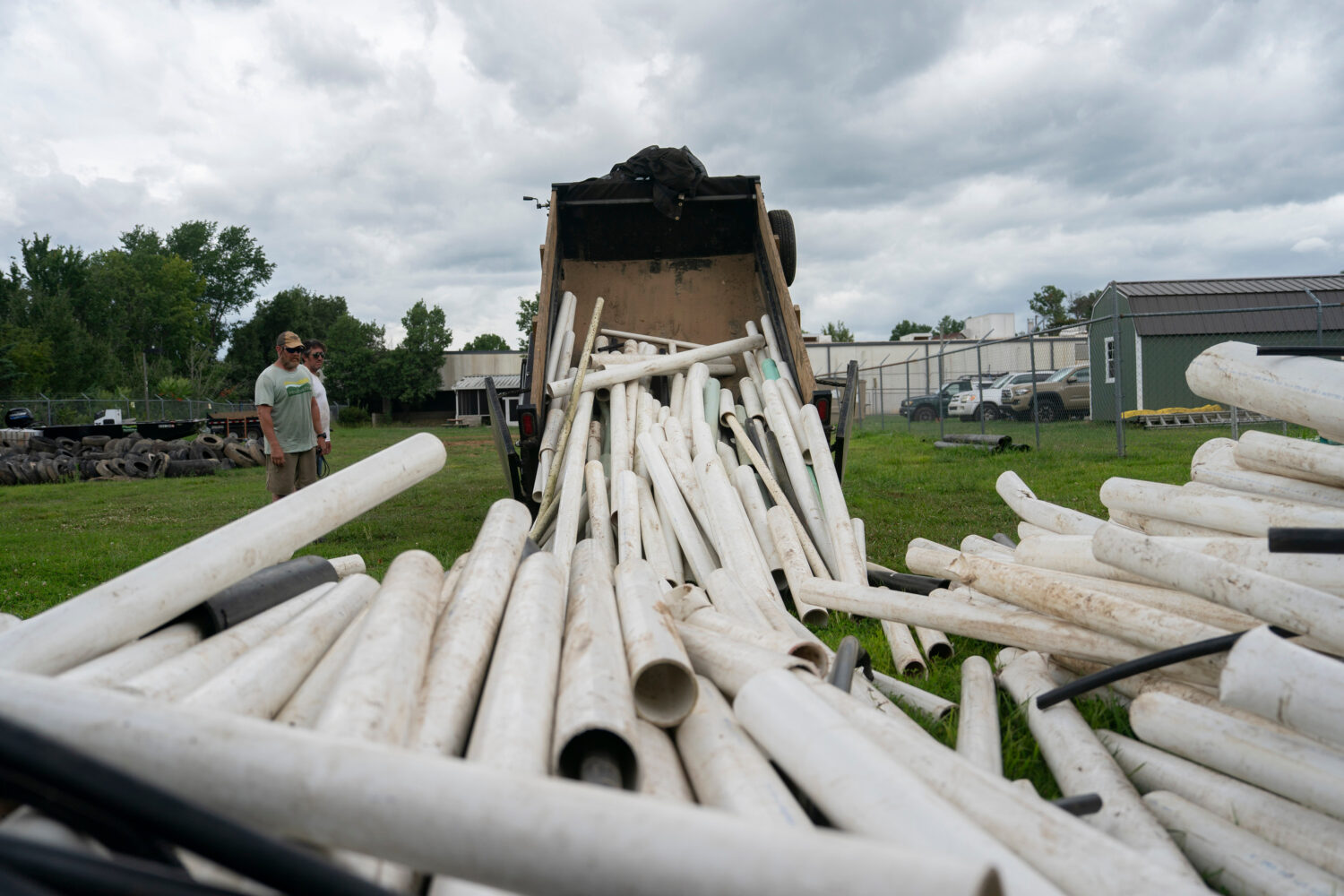 IPEX PVC pipe cleared from the riverbank is dumped at MountainTrue headquarters Wednesday, July 22,...