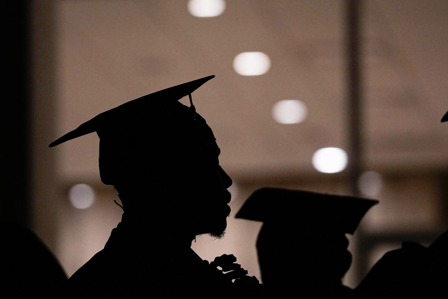 FILE - A Morehouse College student lines up before the school commencement, May 19, 2024, in Atlant...