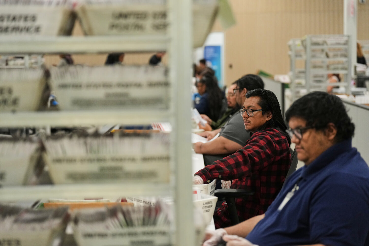 FILE - Ballots are sorted the day after California's primary election at the LA County Ballot Proce...