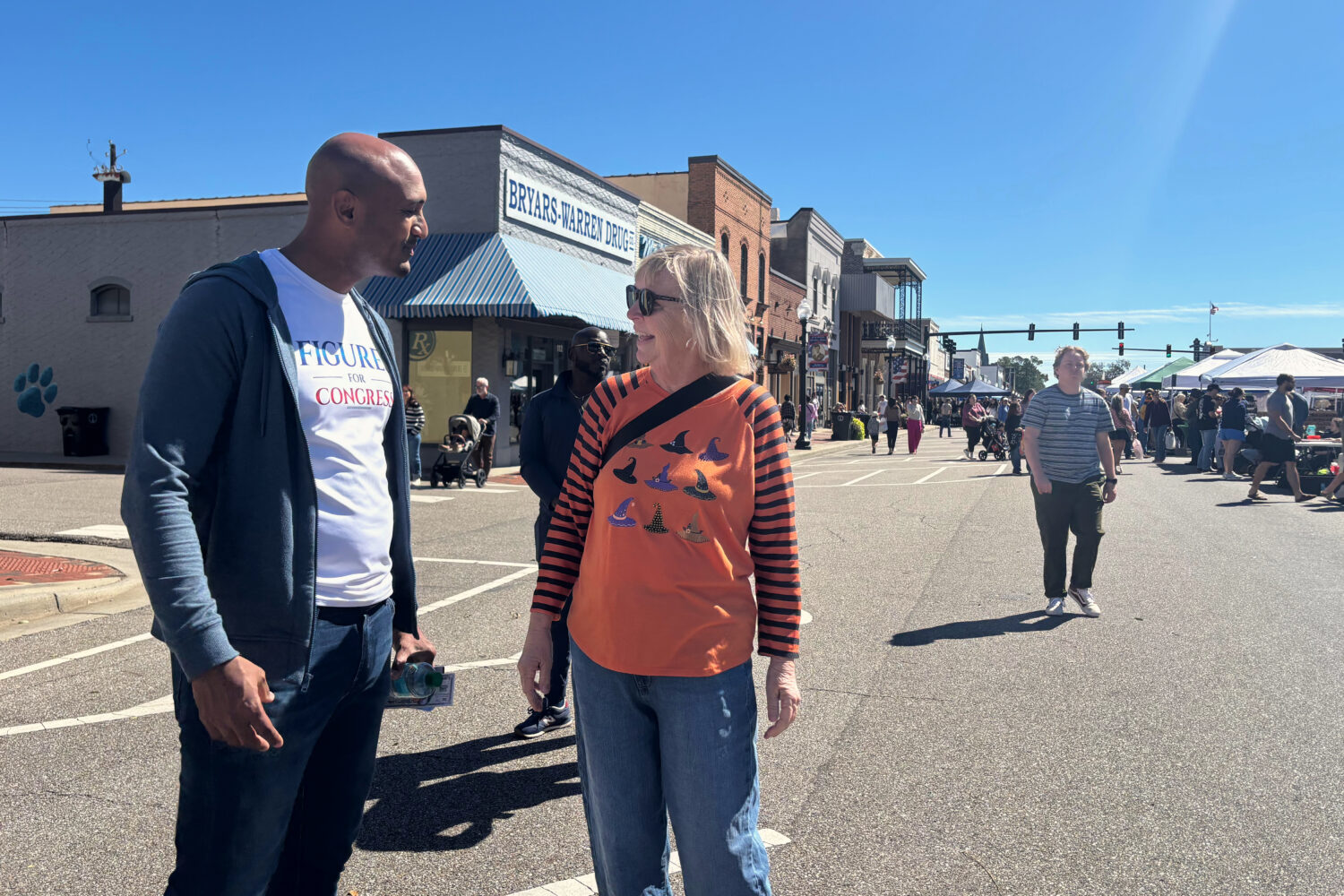 In this photo taken with a smartphone Rep. Shomari Figures, D-Ala., speaks to Jo Ellen Simmons at t...