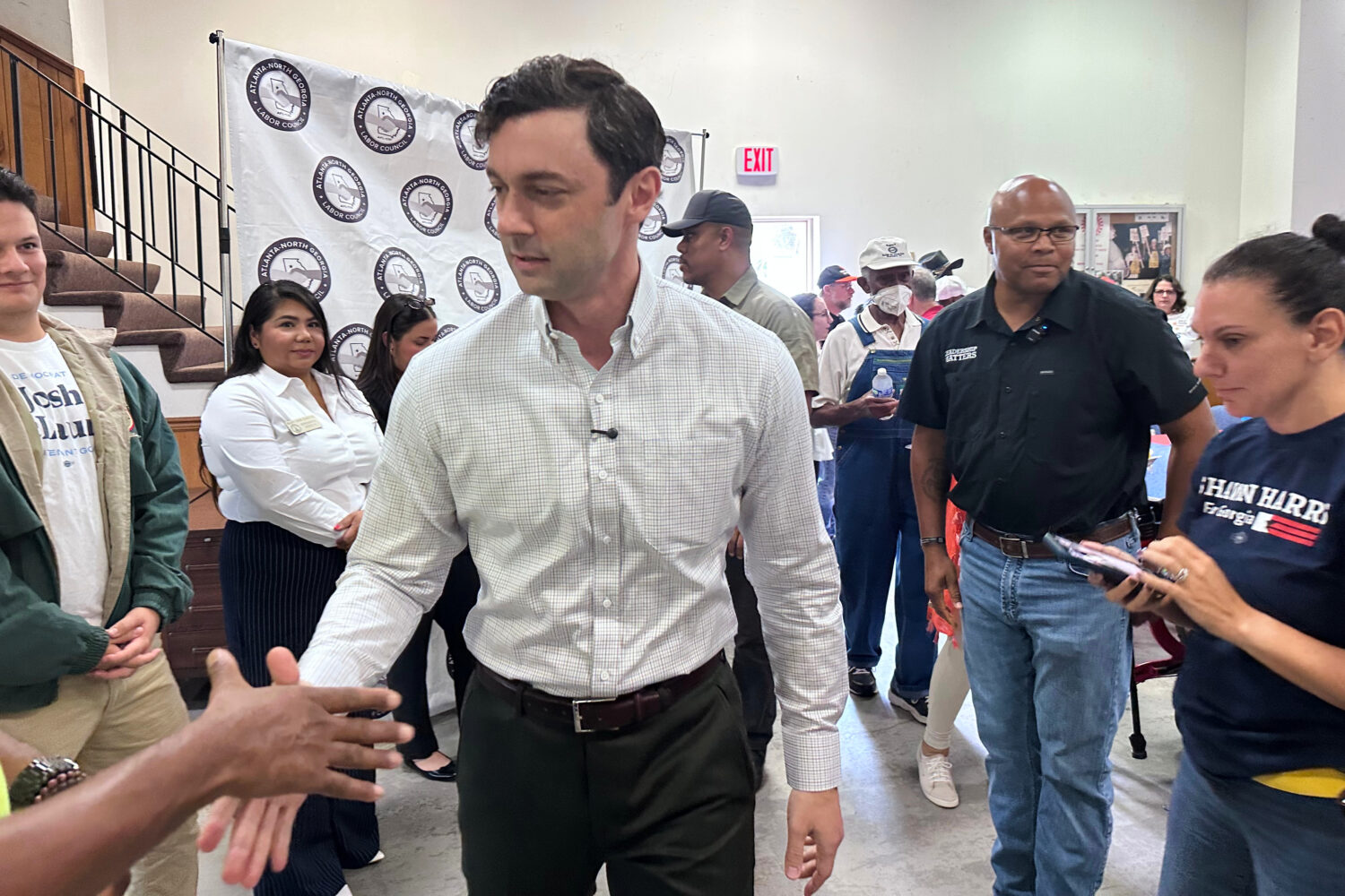 This photo taken with a smartphone shows Sen. Jon Ossoff, D-Ga., greeting union members at an Atlan...