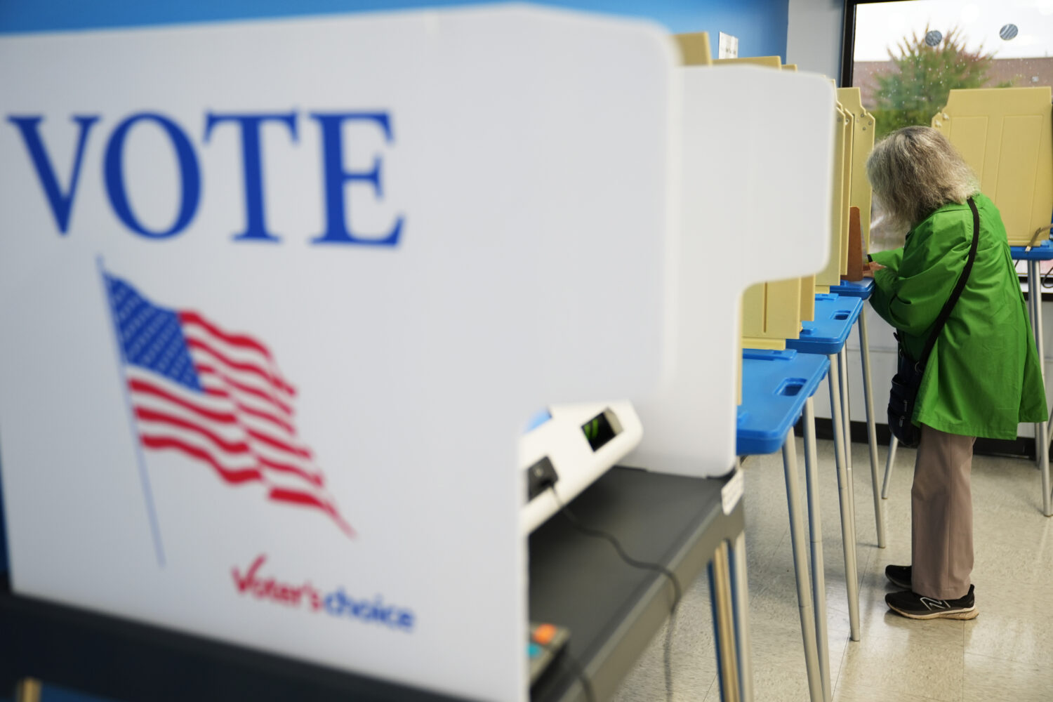 A voter cast a ballot on the first day of early voting in Minnesota at the Elections & Voter Servic...