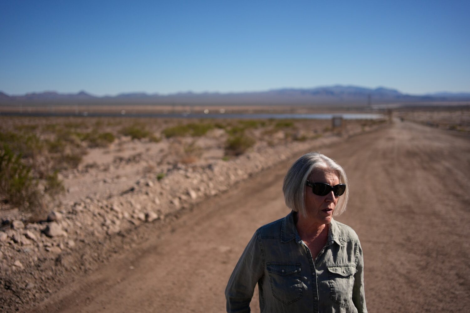 Janelle Sorenson stands beside land for a proposed data center Friday, Oct. 2, 2026, near Boulder C...