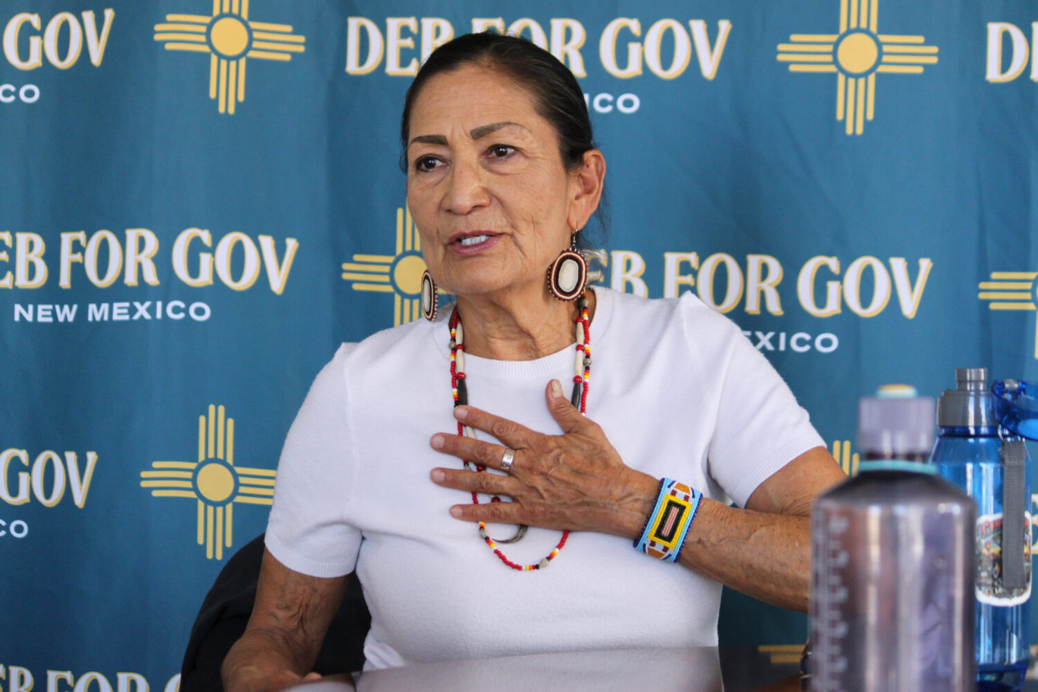 In this photo taken with a smartphone, Democratic gubernatorial nominee Deb Haaland answers questio...