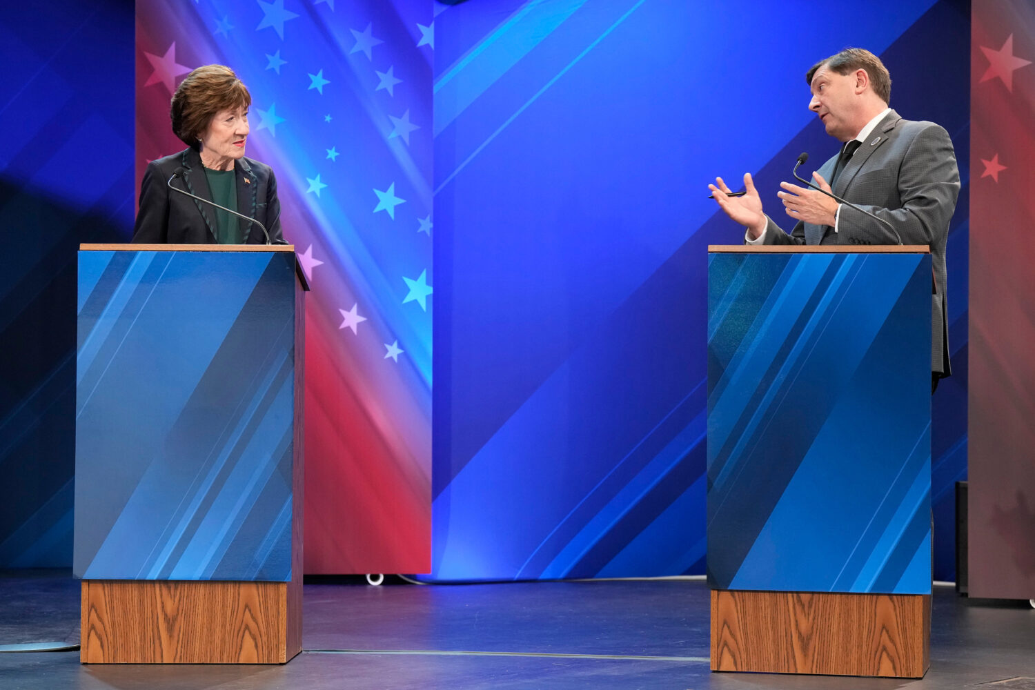 Troy Jackson (D) directs a question to Sen. Susan Collins (R) during the final Maine U.S. Senate de...