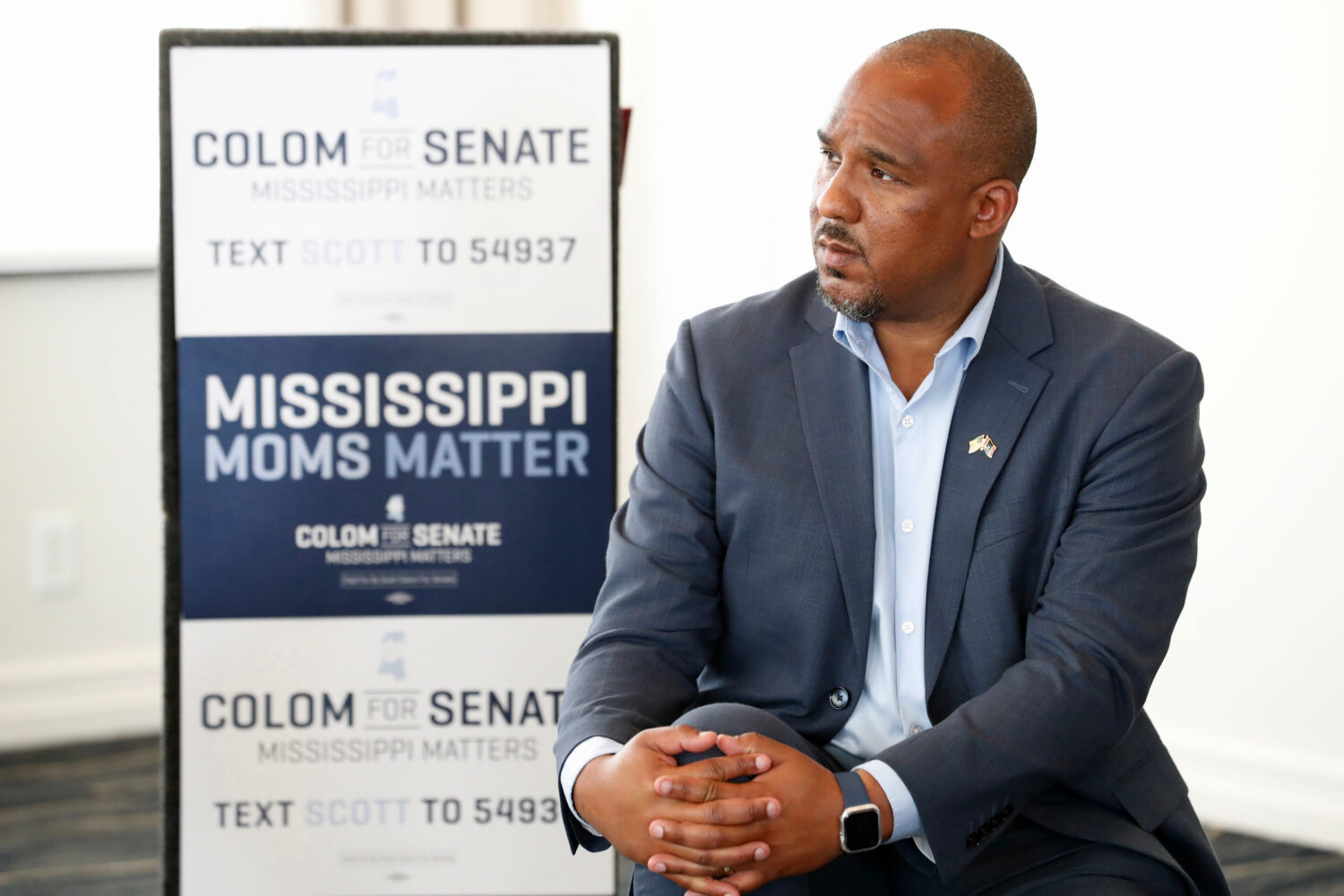 FILE - Mississippi Democratic U.S. Senate candidate Scott Colom listens during a maternal health ro...