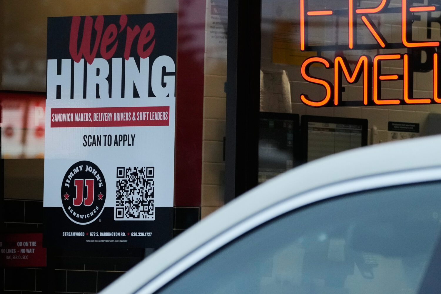 A hiring sign is displayed at a sandwich shop, in Streamwood, Ill., Wednesday, Sept. 16, 2026. (AP ...