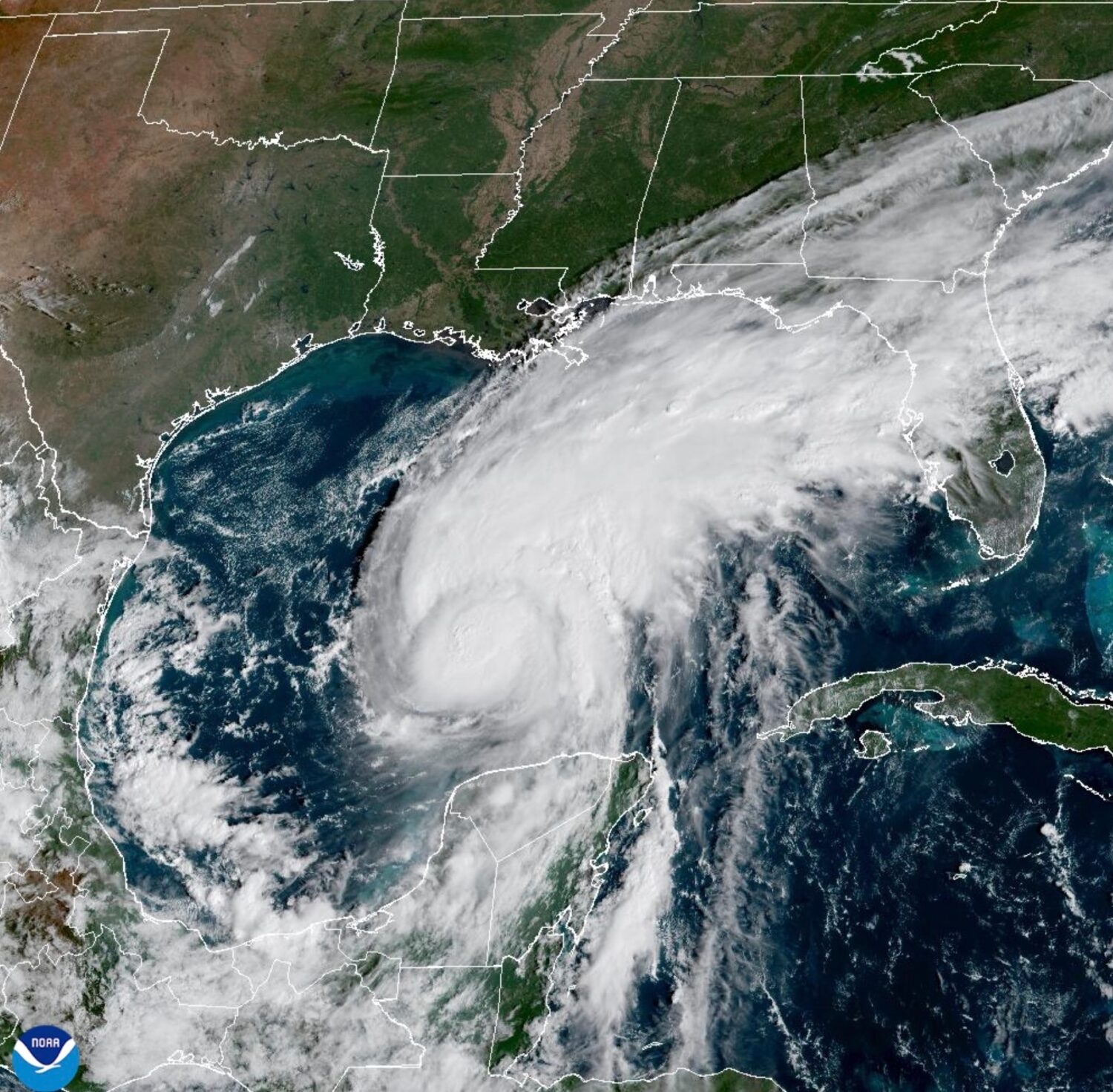 This satellite image from the National Oceanic and Atmospheric Administration shows Hurricane Isaia...
