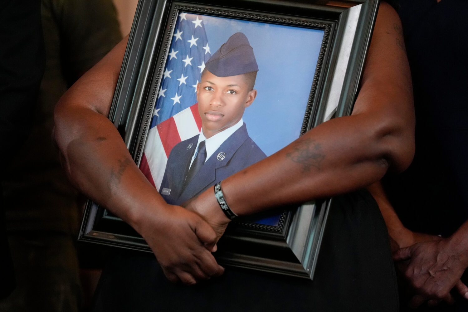 FILE - Chantemekki Fortson, mother of slain U.S. Air Force senior airman Roger Fortson, holds a pho...