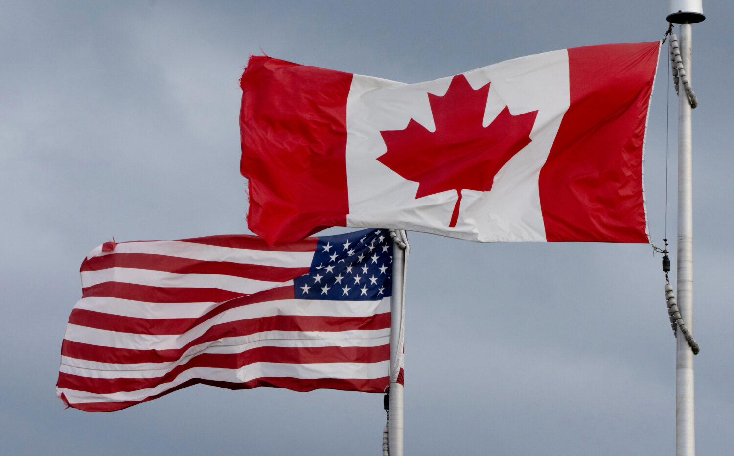 FILE - The flags of Canada and the United States fly in Ottawa, Sept. 12, 2026. (Adrian Wyld/The Ca...