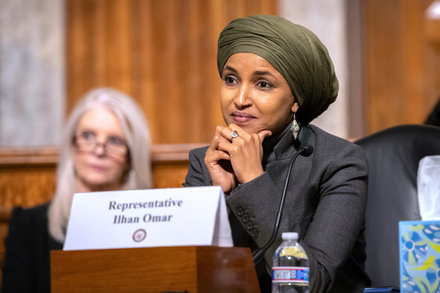 FILE - Rep. Ilhan Omar, D-Minn., listens during a Congressional spotlight hearing on Capitol Hill, ...