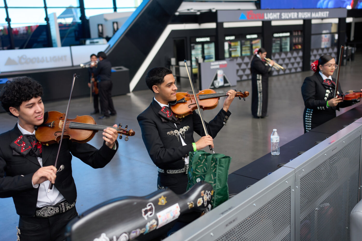 Axel Rodríguez Olivas, center, and Blanier Bojorquez, left, warm up with other University of Nevad...
