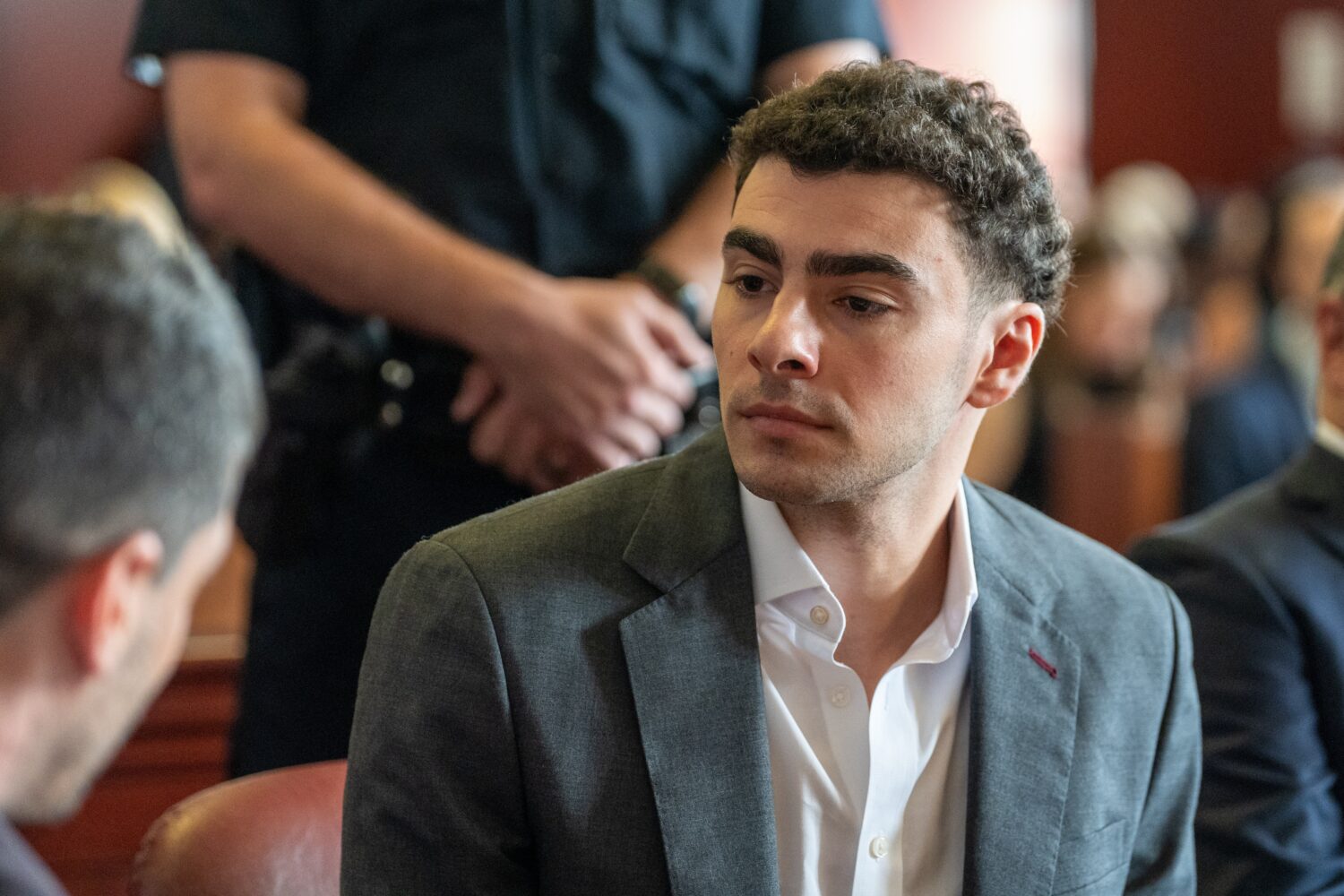FILE - Luigi Mangione appears for a pre-trial hearing at Manhattan Criminal Court in New York, on A...