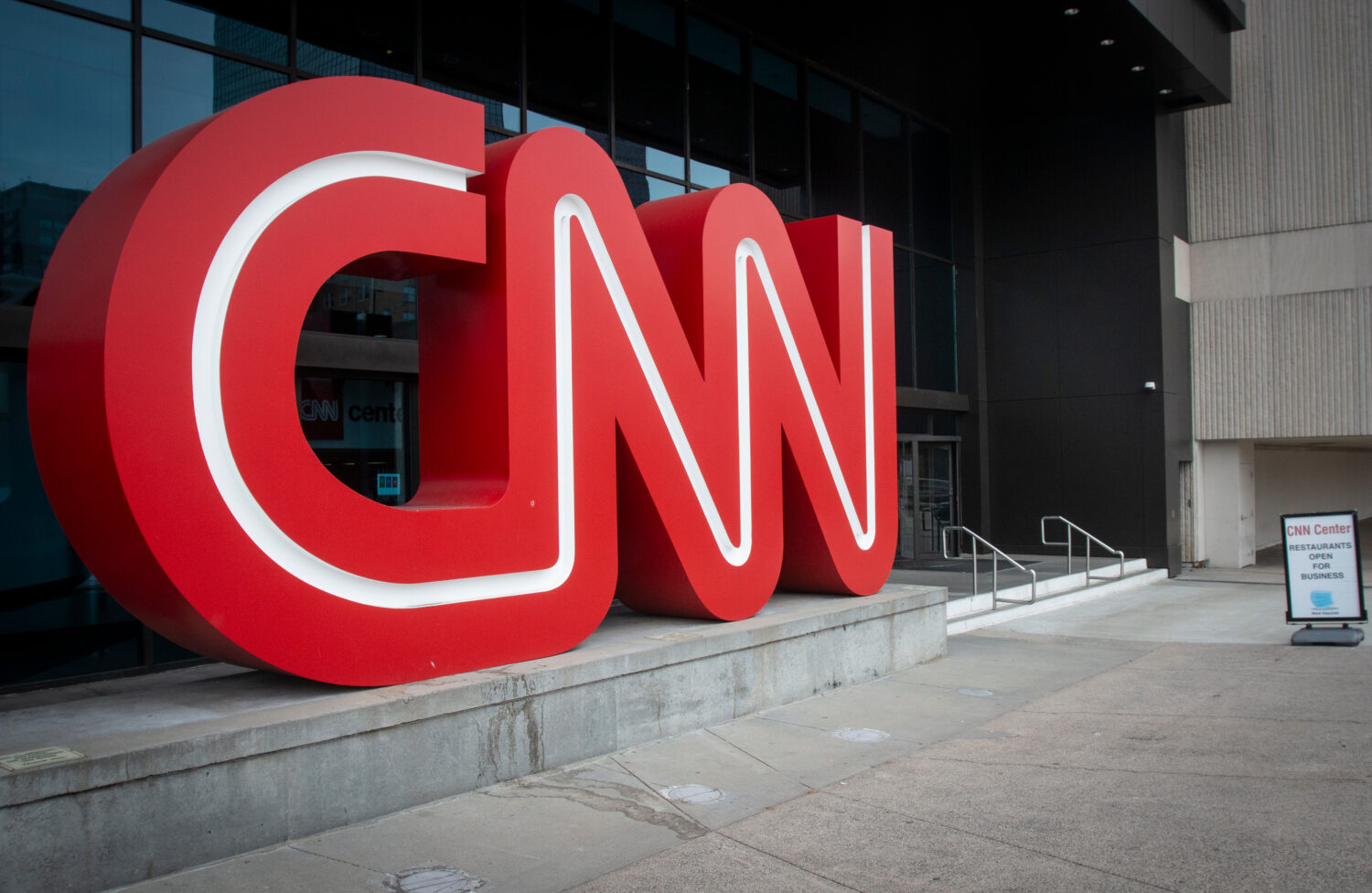 FILE - The CNN logo is displayed at the entrance to the CNN Center in Atlanta on Feb. 2, 2022. (AP ...
