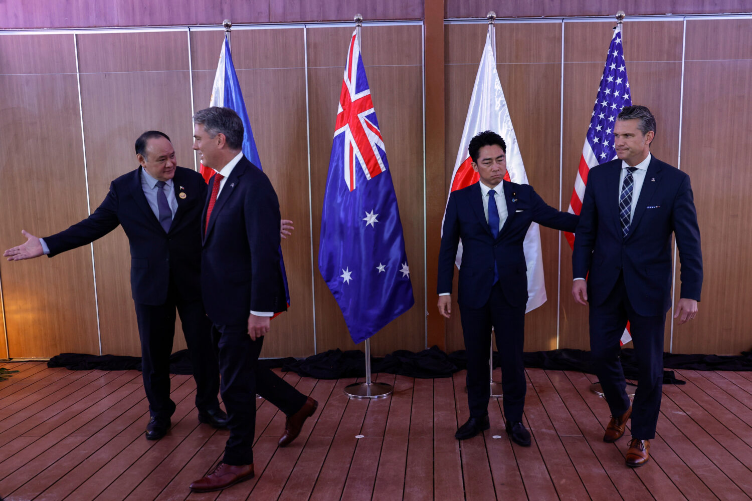 From left, Philippines Defense Secretary Gilberto Teodoro, Australia Defense Minister Richard Marle...