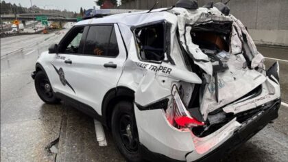 A crash involving a motorhome and a Washington State Patrol vehicle injured the trooper and sent th...