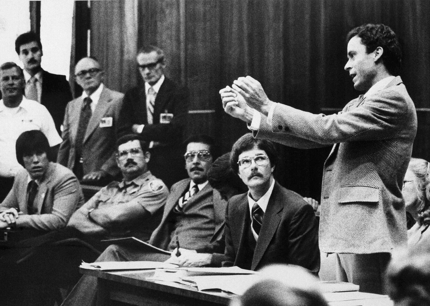 FILE - Ted Bundy presents a motion during his murder trial in Miami, June 25, 1979. (AP Photo, Pool...