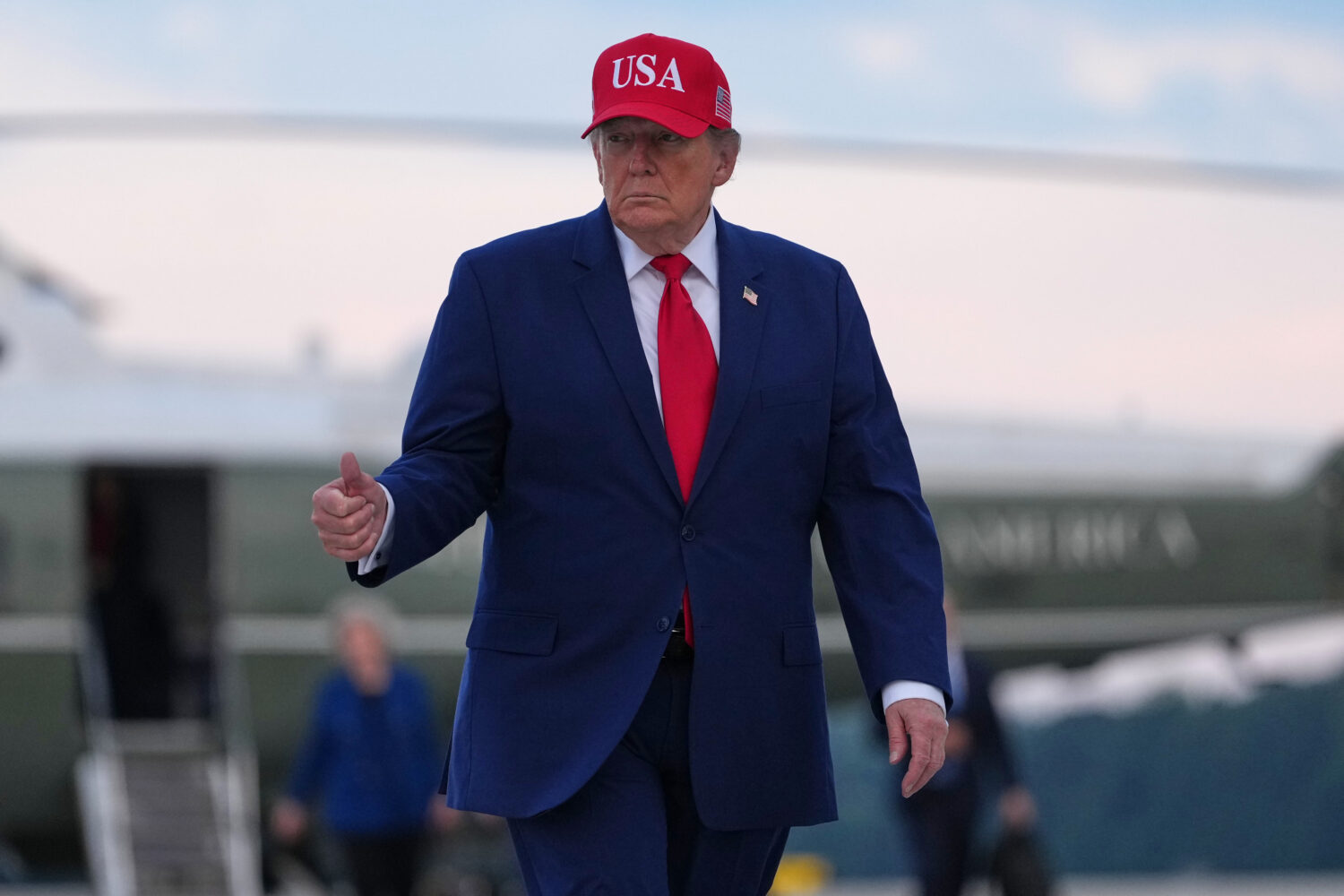 President Donald Trump walks from Marine One to board Air Force One, Friday, Oct. 16, 2026, at Dobb...