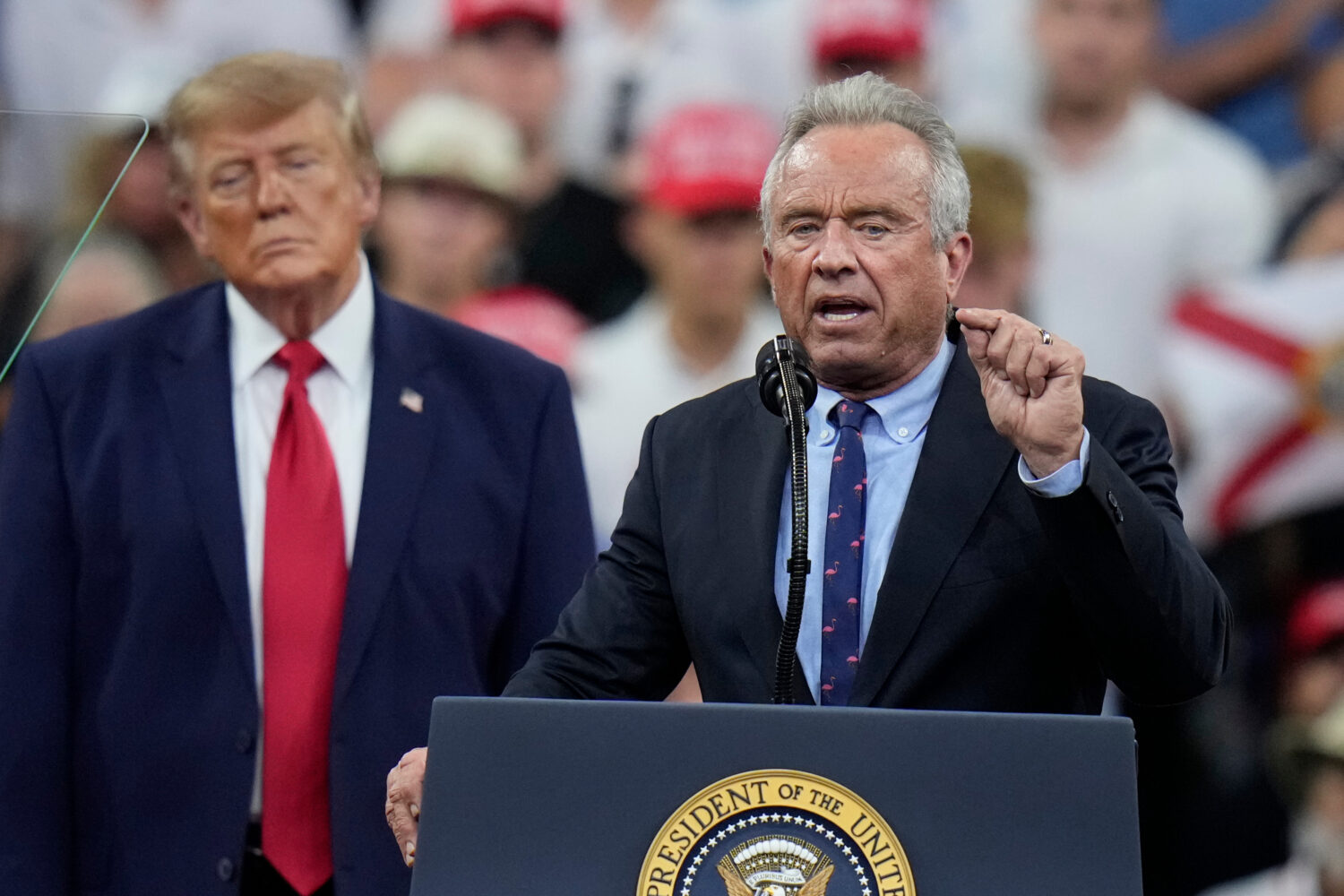 Health and Human Services Secretary Robert F. Kennedy Jr. speaks as President Donald Trump listens ...