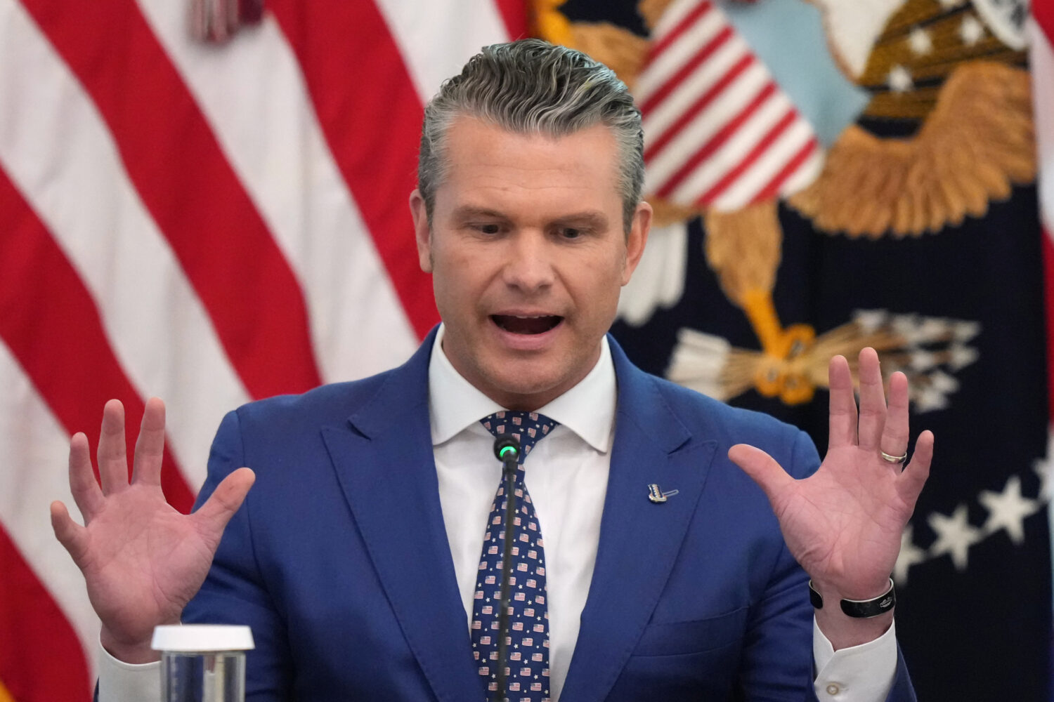 Defense Secretary Pete Hegseth speaks at a roundtable event with President Donald Trump in the East...