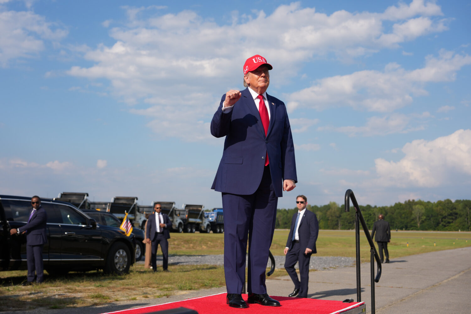 President Donald Trump arrives at a campaign rally at Dalton Municipal Airport, Friday, Oct. 16, 20...