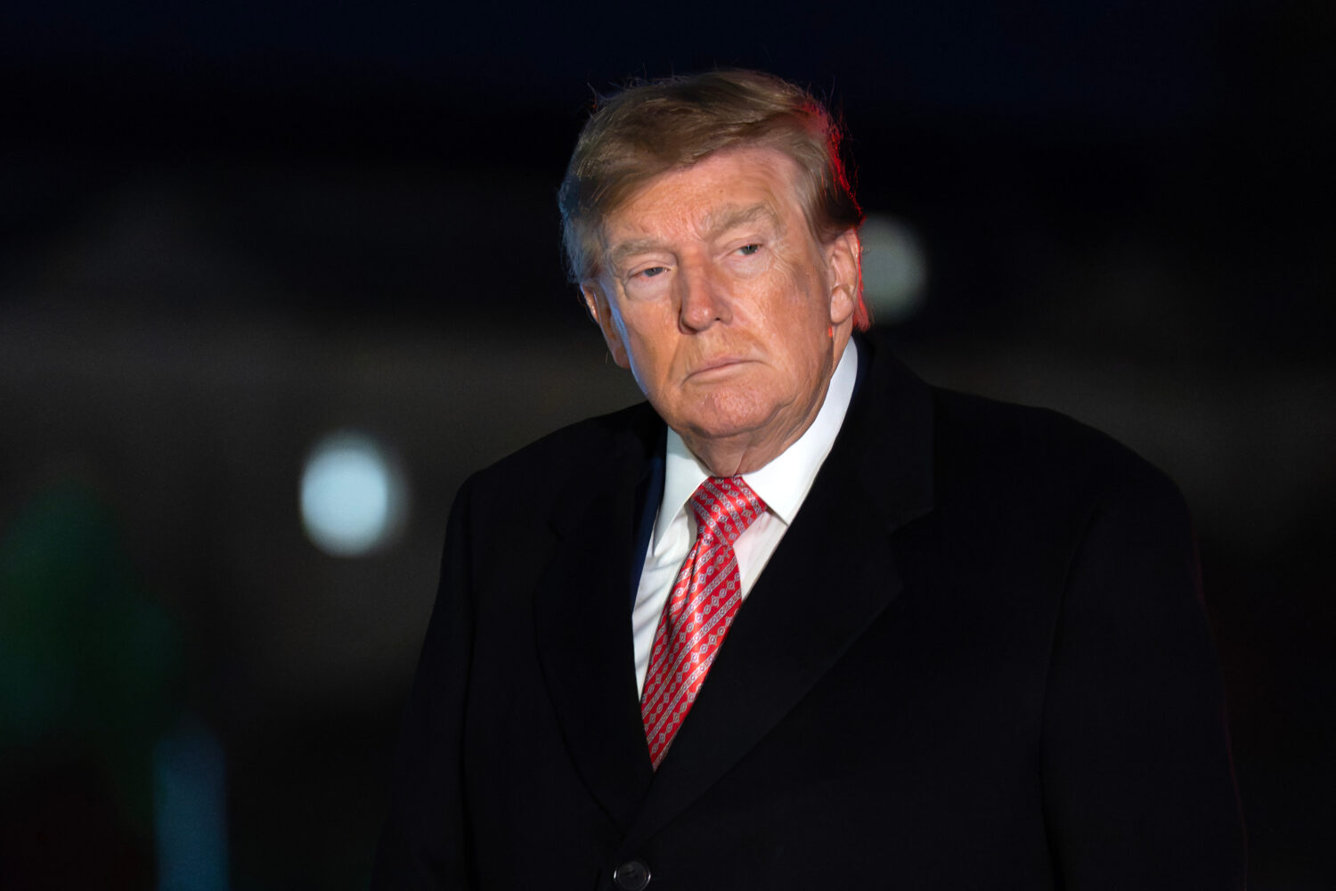President Donald Trump walks on the South Lawn upon his arrival to the White House, Sunday, Oct. 18...