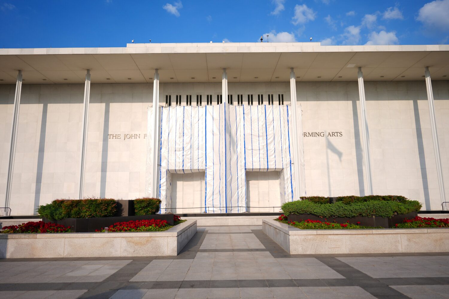 A tarp covers a portions of the signage at the John F. Kennedy Center for the Performing Arts, Thur...