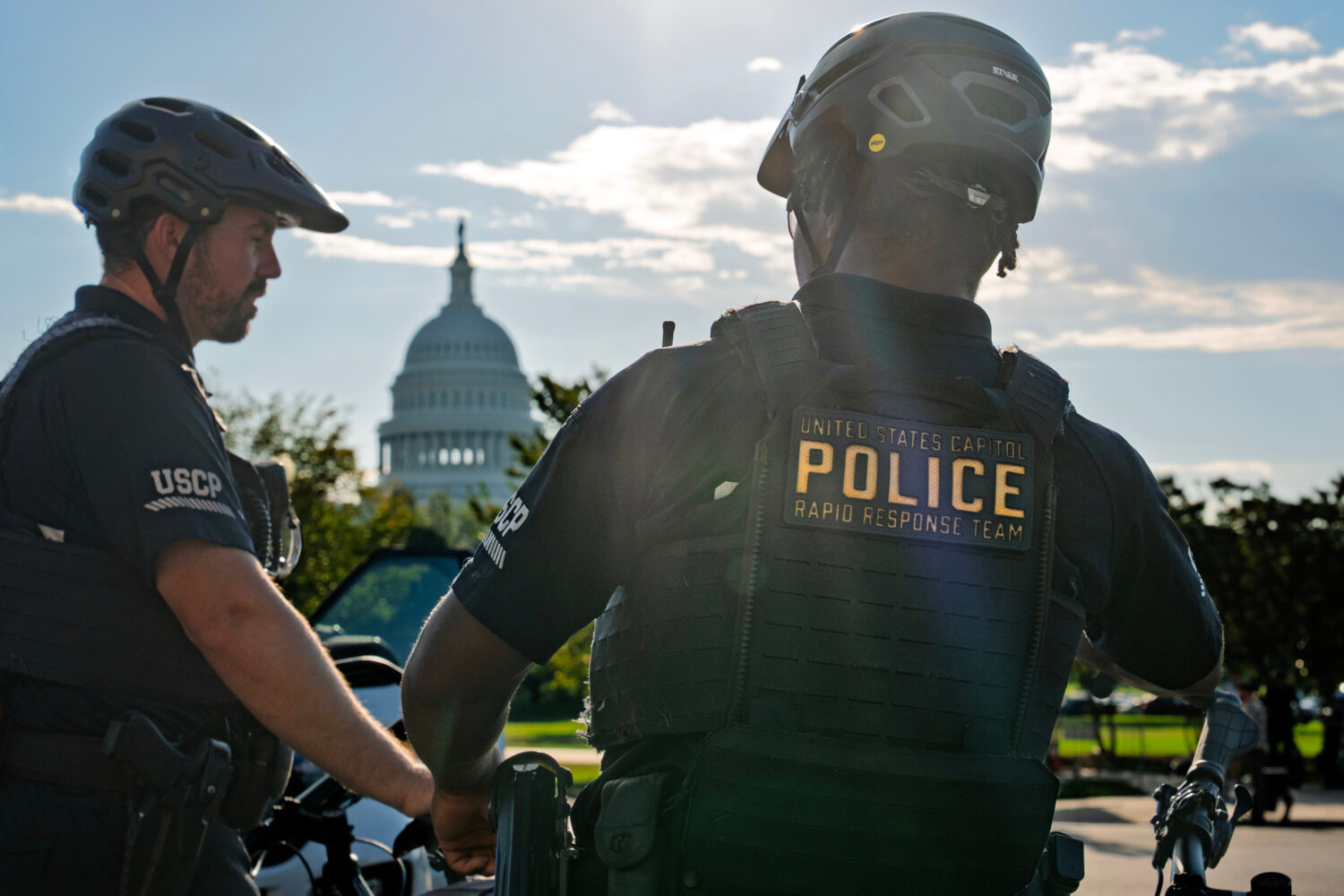 U.S. Capitol Police secure an intersection near the Capitol as activists stop traffic and call for ...