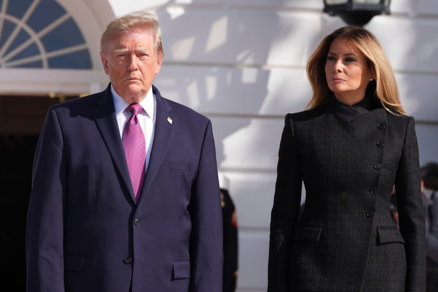 President Donald Trump, left, and first lady Melania Trump arrive to greet China's President Xi Jin...