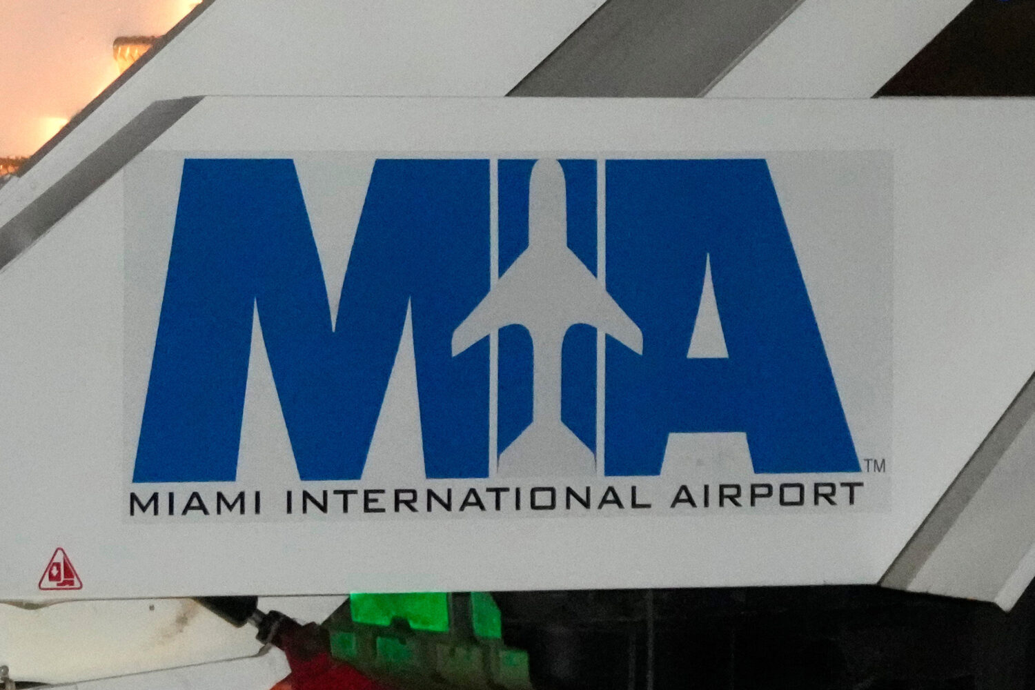 FILE - The logo of the Miami International Airport is seen on mobile boarding stairs in Miami on Ma...