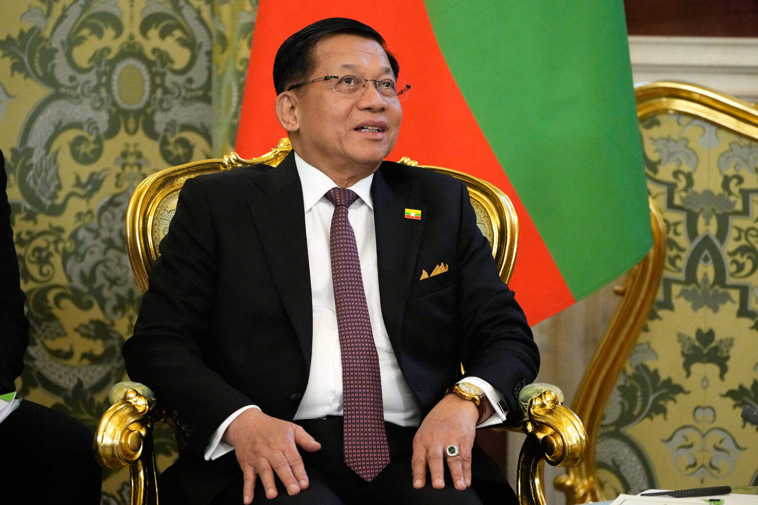 FILE - Myanmar President Min Aung Hlaing speaks during a meeting with Russian President Vladimir Pu...