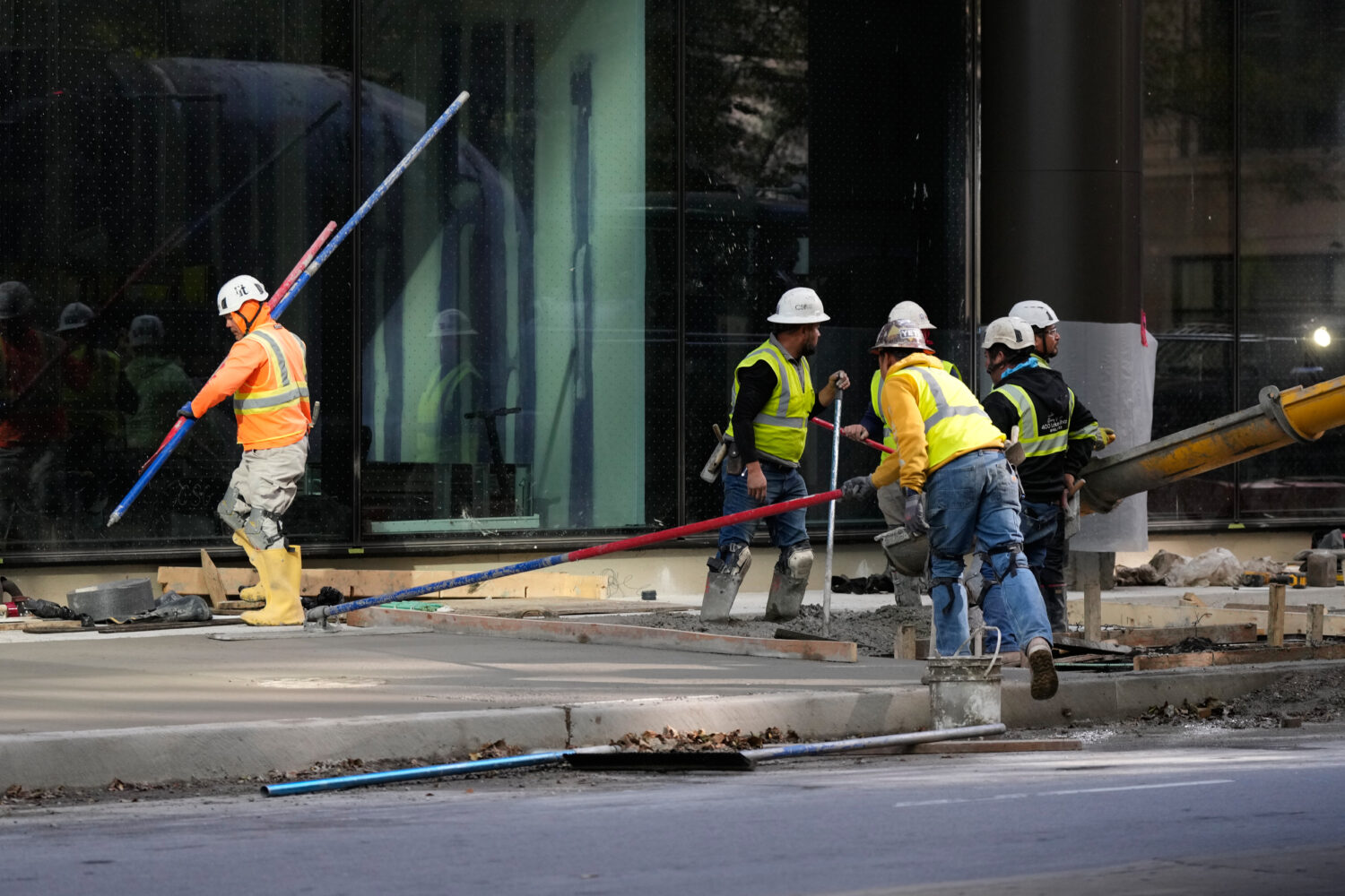 Construction workers work in Chicago, Tuesday, Oct. 20, 2026. (AP Photo/Nam Y. Huh)Credit: AP Photo...