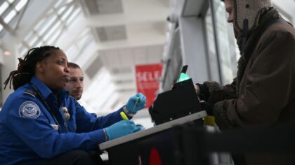 tsa standing up security airport...