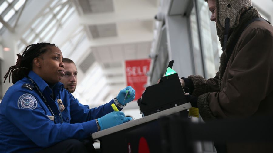 tsa standing up security airport...