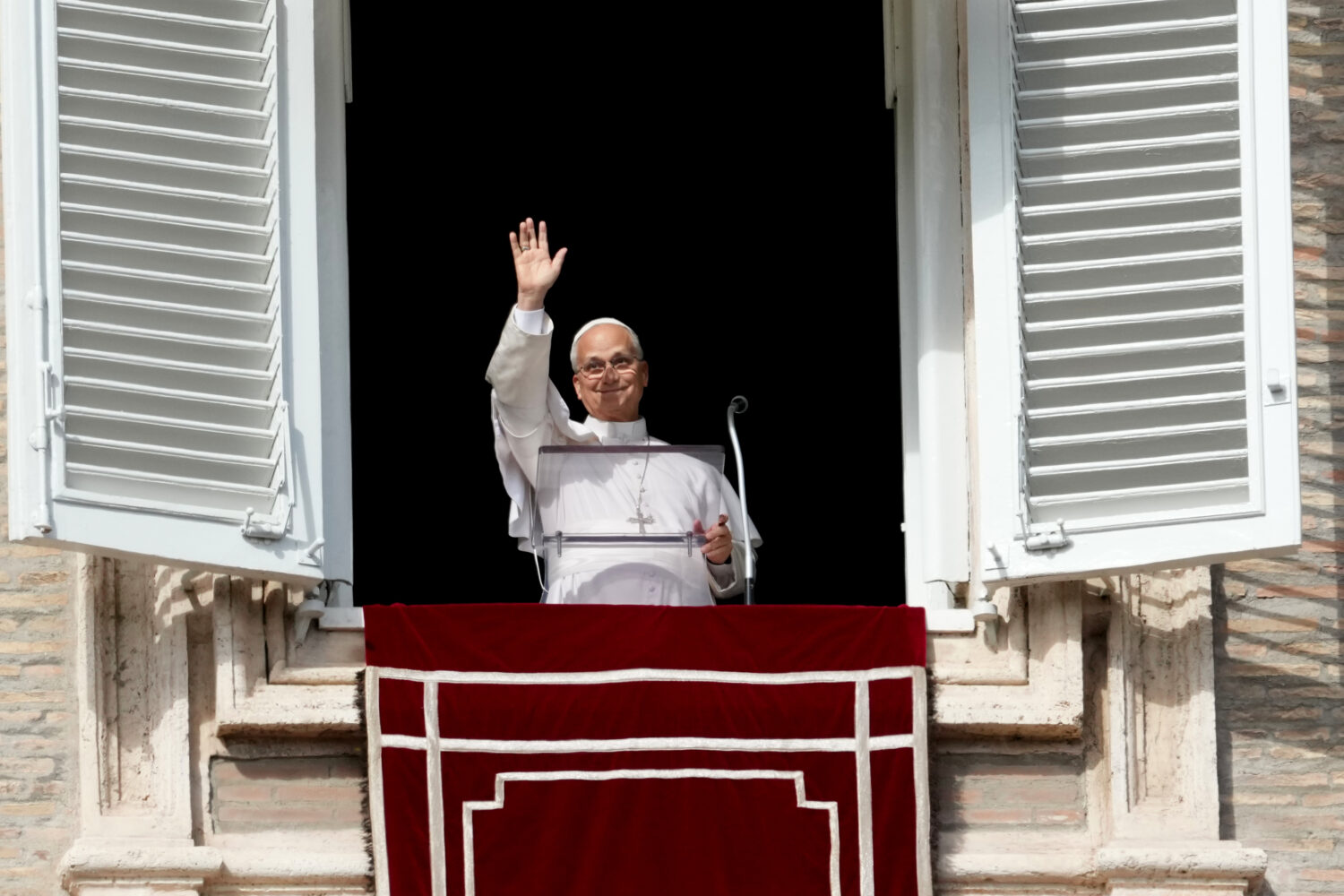 Pope Leo XIV delivers the Angelus noon prayer in St. Peter's Square, at the Vatican, Sunday, Oct. 2...