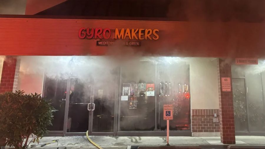Firefighters prevented a smoky commercial fire from spreading to other businesses in Edmond's Westg...