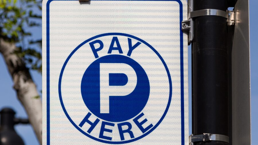 pay parking sign...