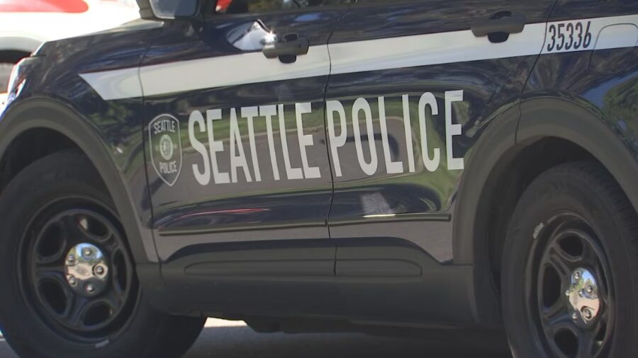 seattle police vehicle - man shot...