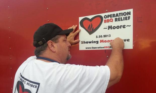 A volunteer in Moore, Oklahoma. Photo courtesy of Operation BBQ Relief....