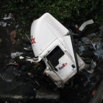 Chunks of the FedEx truck that hit a barrier and caused southbound I-5 to close during the morning commute are scene from above. As crews worked to clear a cab of a semi truck from an earlier wreck, diesel fuel started leaking on southbound Interstate 5. 