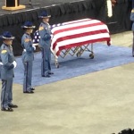 The casket of Trooper Sean O'Connell is moved into Comcast Arena for a memorial to honor his life. He was killed while on duty last Friday.