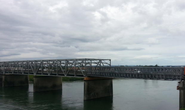Traffic crosses the temporary span of the I-5 bridge over the Skagit River Wednesday following a ne...