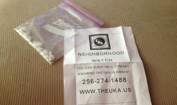 Many Des Moines, Washington residents received KKK messages inside a baggie weighted down by small ...