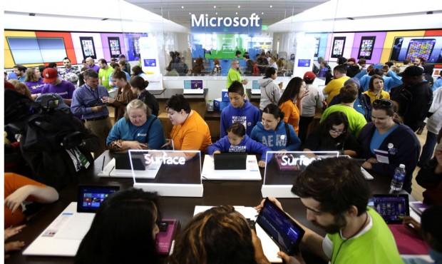 Microsoft assists people with their technological needs and questions. (AP Photo)...