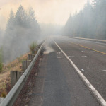 US 97 remains closed due to the close proximity of the fire and smoke to the highway.