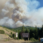 A smoke plume rises from the hillside on Friday, July 26. As seen from just outside of the Yakama Indian Reservation.