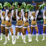 Seattle Seahawks Sea Gals cheerleaders perform before an NFL football game between the Seattle Seahawks and the San Francisco 49ers, Sunday, Sept. 15, 2013, in Seattle. (AP Photo/Elaine Thompson)